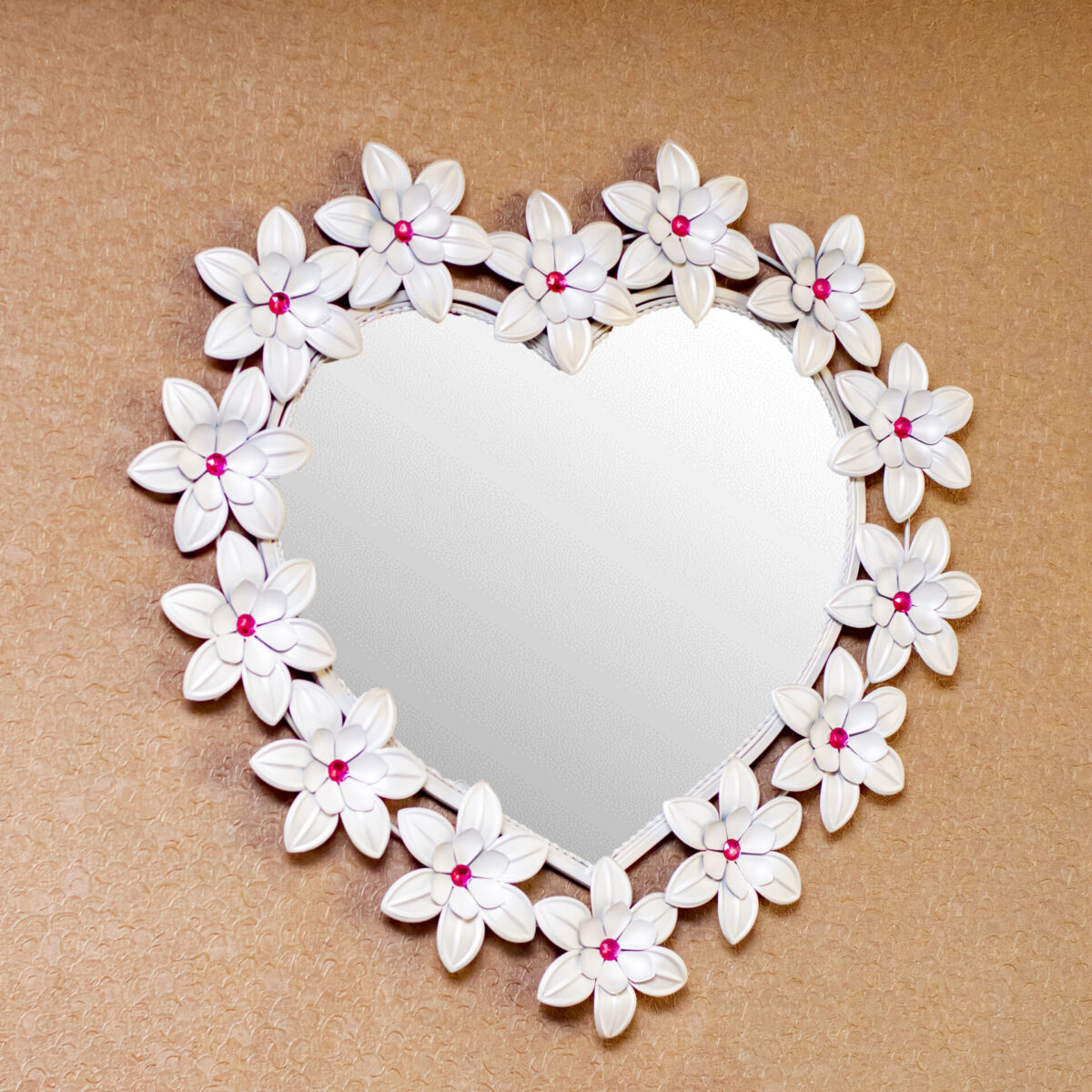 accent-wall-mirror-heart-shaped-in-a-white-floral-frame-with-stones-394435