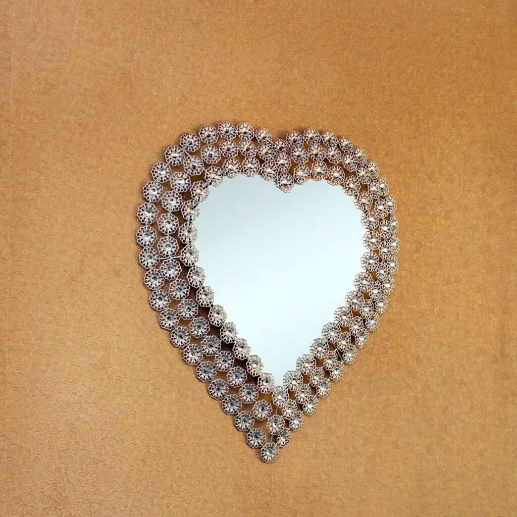 accent-wall-mirror-metal-heart-shaped-set-in-silver-frame-and-stones-115669