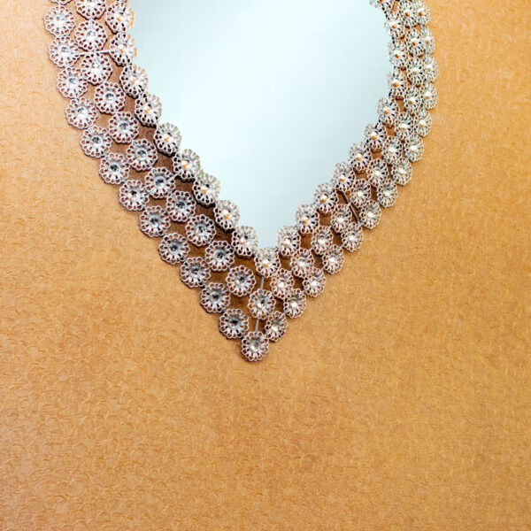 accent-wall-mirror-metal-heart-shaped-set-in-silver-frame-and-stones-324473
